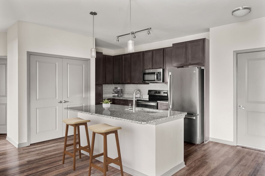 Create meals and memories in your modern kitchen. - 1760 Apartments