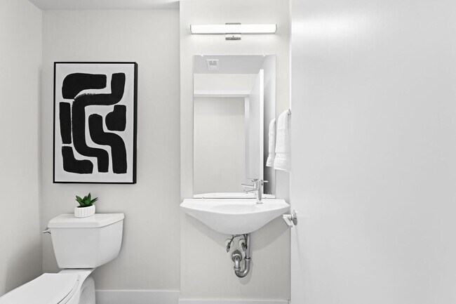 Building Photo - Modern 2-Bedroom Rowhome with Rooftop Moun...