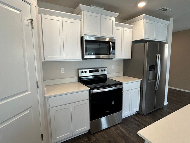 Building Photo - Brand New & Beautiful- 4 bed/2.5 ba + Loft, EV Garage Charging, Quartz Countertops, Fenced Yard!