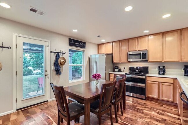 Building Photo - Updated 4-Bedroom with Serene Outdoor Spac...