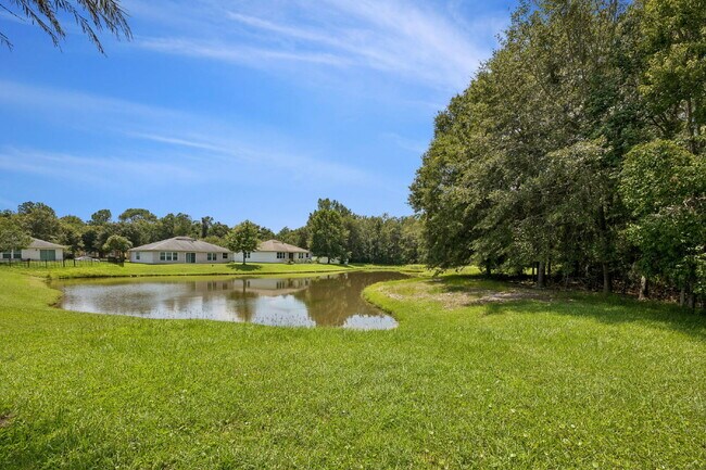 Building Photo - Elegant 4BR Home with Gourmet Kitchen, Smart Tech Package & Nature Views - Coming Soon