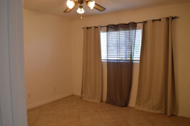 Building Photo - Four Bedroom, Two Bathroom Single Story Home With Two Car Garage