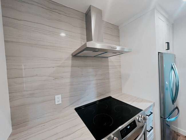 Kitchen Range & Fridge - 6742 De Longpre Ave