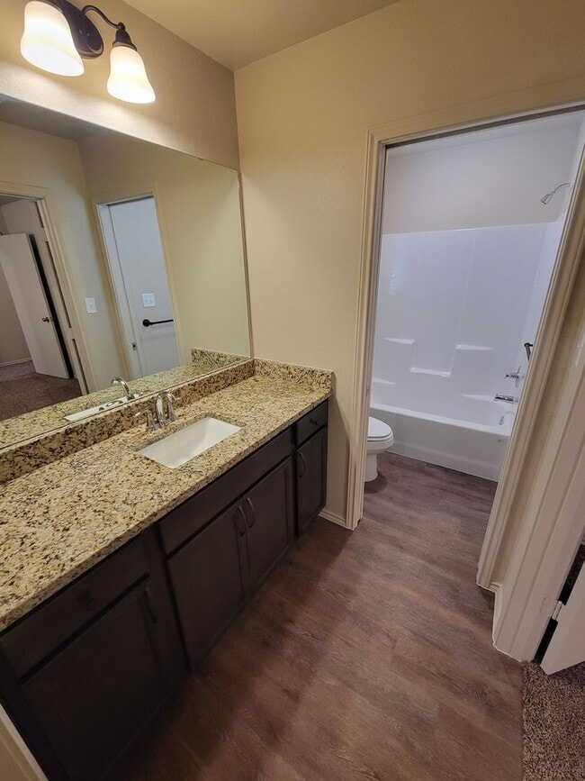 Building Photo - Bryan -3 bedroom / 2 bath / 2 car garage / Large fenced in back yard.