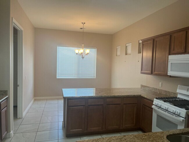Building Photo - Three Bedroom-Two Bath-2.5 Car Garage ~ Gr...