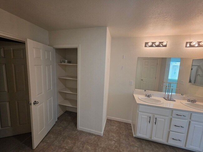 Building Photo - Spacious 5BR + Loft in Hamptons Village – Studio Suite, New HVAC, EV Charging