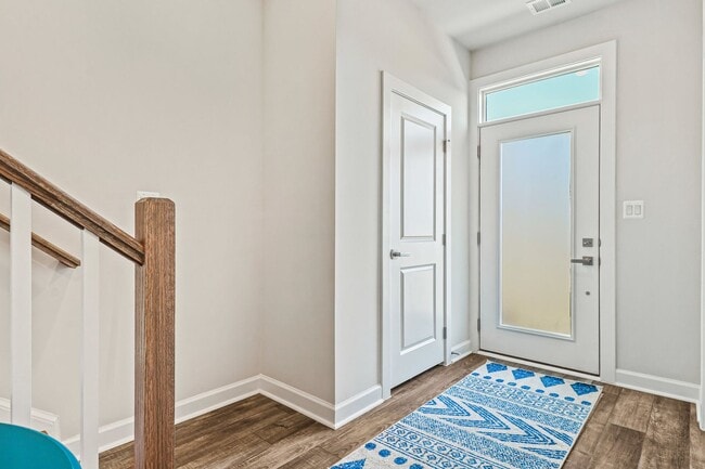 Building Photo - Your new home awaits you! Luxury Townhouse...
