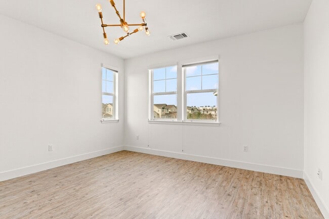 Building Photo - Sun-Filled Corner 4BR w/ Dual Yards & Panoramic Indoor-Outdoor Flow