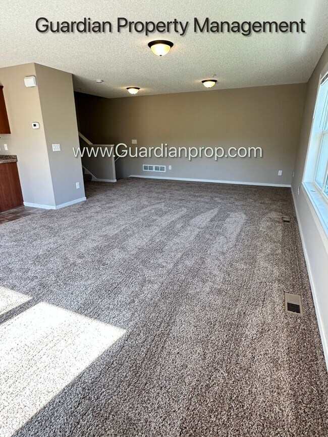 Building Photo - Champlin Corner Unit Town Home, 2 Car Garage, Dishwasher, Washer/Dryer, Balcony