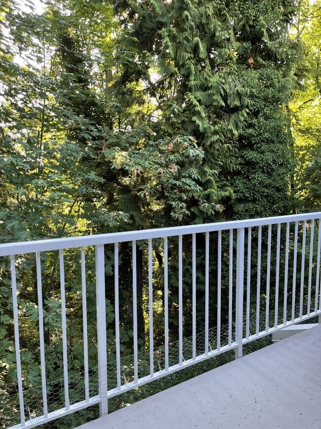 Building Photo - Bright, Spacious, Updated Condo with Separ...