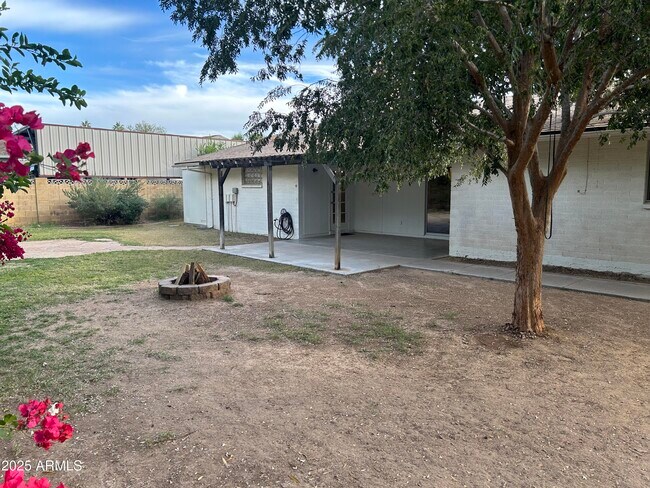 Building Photo - 6120 E Hobart St