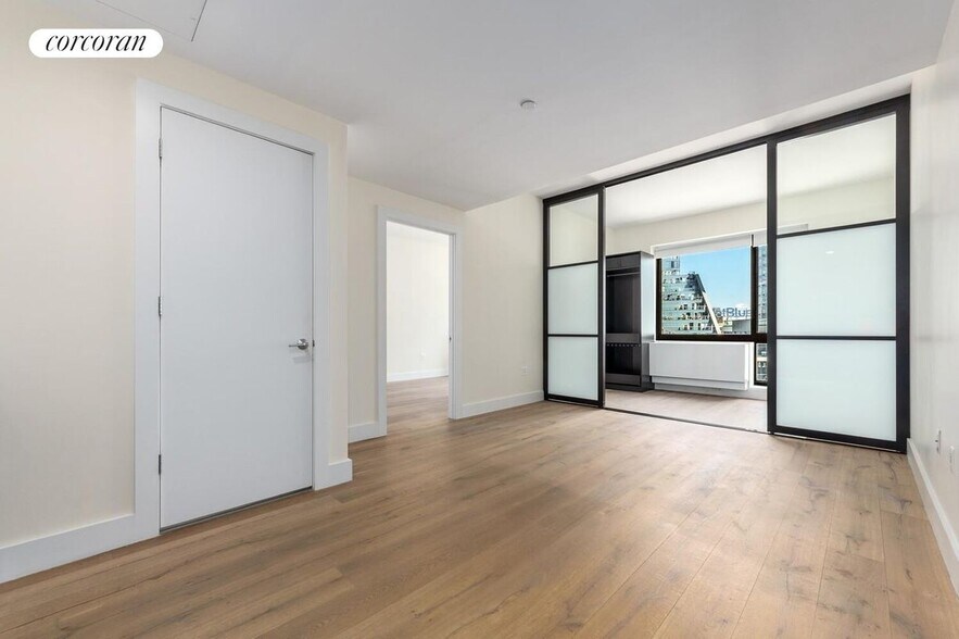 Building Photo - 25-21 43rd Ave