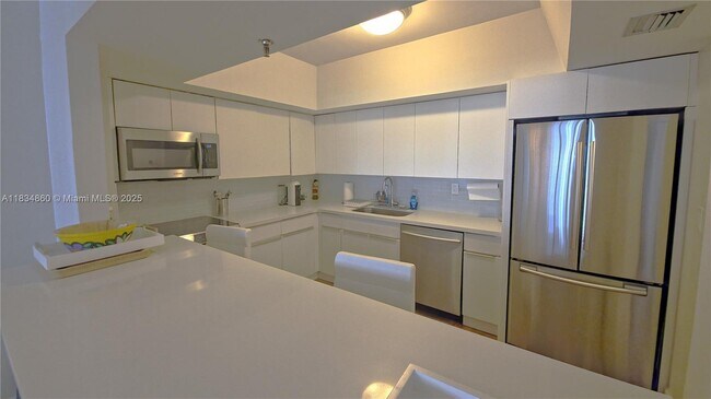 Building Photo - 9455 Collins Ave