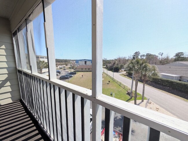 Building Photo - Dreamy Little River Condo — Furnished, Elevator Access, Pool & Marina Nearby!