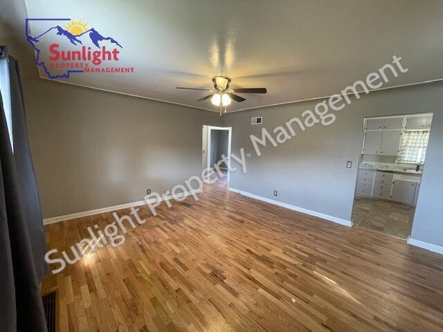 Building Photo - "Charming 2-Bed Home with Gleaming Hardwood Floors in Billings, MT!"