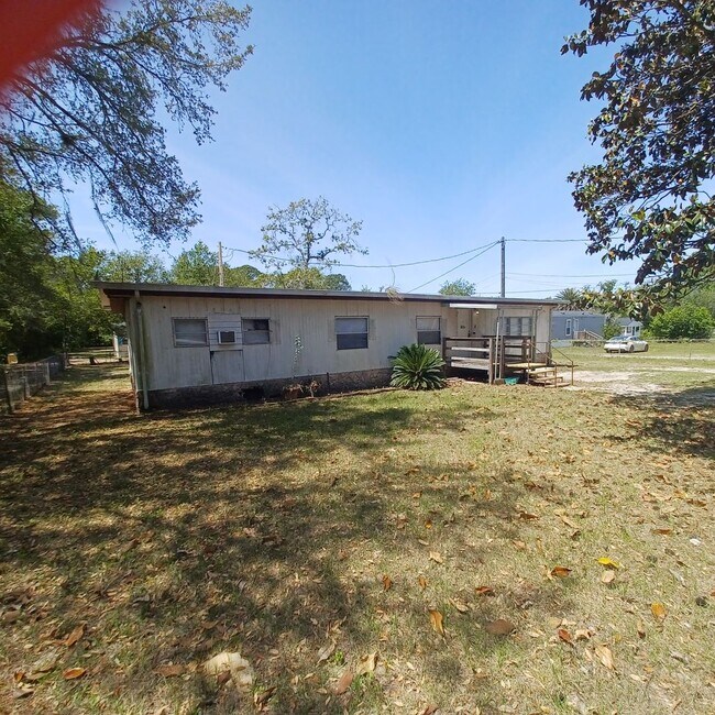 Building Photo - 3 BR 2 BA mobile home on half an acre