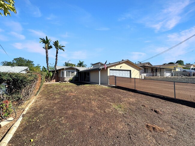 Building Photo - Beautiful 4BD/2BA W/ 2-Car Garage, AC, and...