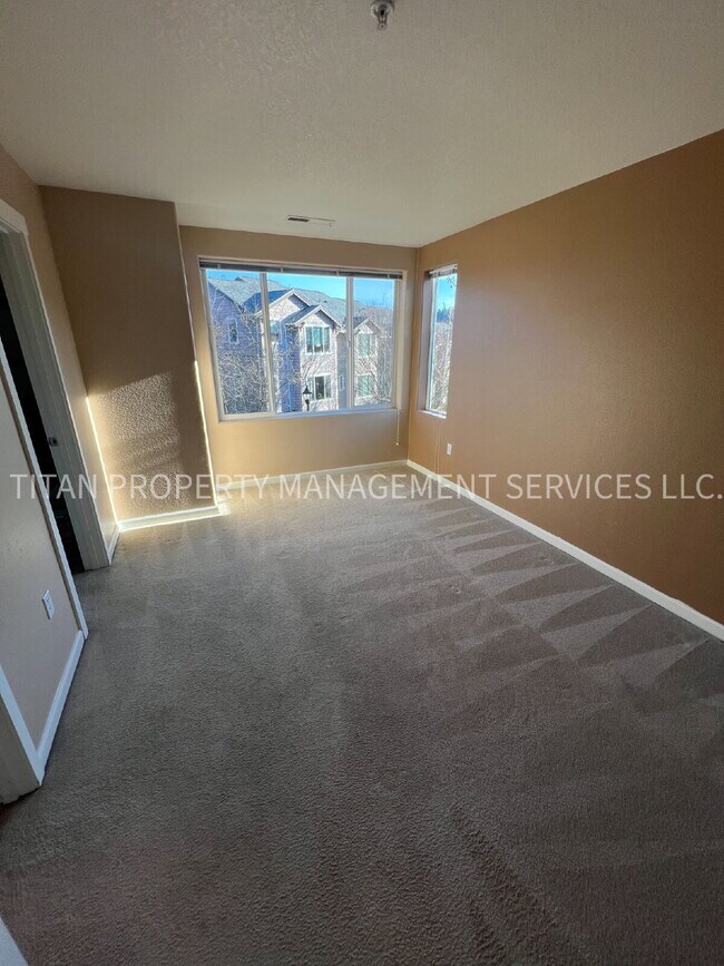 Building Photo - Beautiful Three Story Townhouse with Gas Fireplace, Balcony & 2-Car Garage