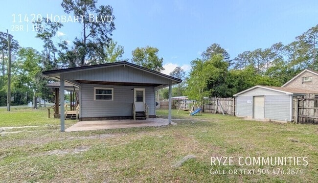 Building Photo - 11420 Hobart Blvd