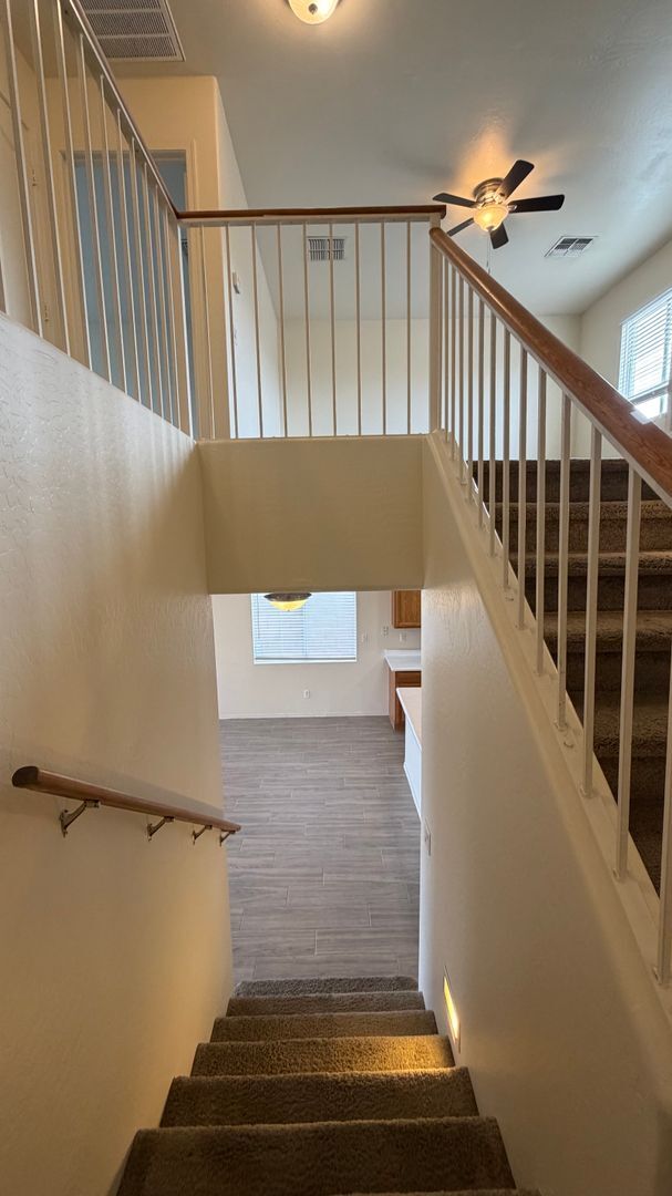 Building Photo - Two Story Home with NEW tile and a large backyard!