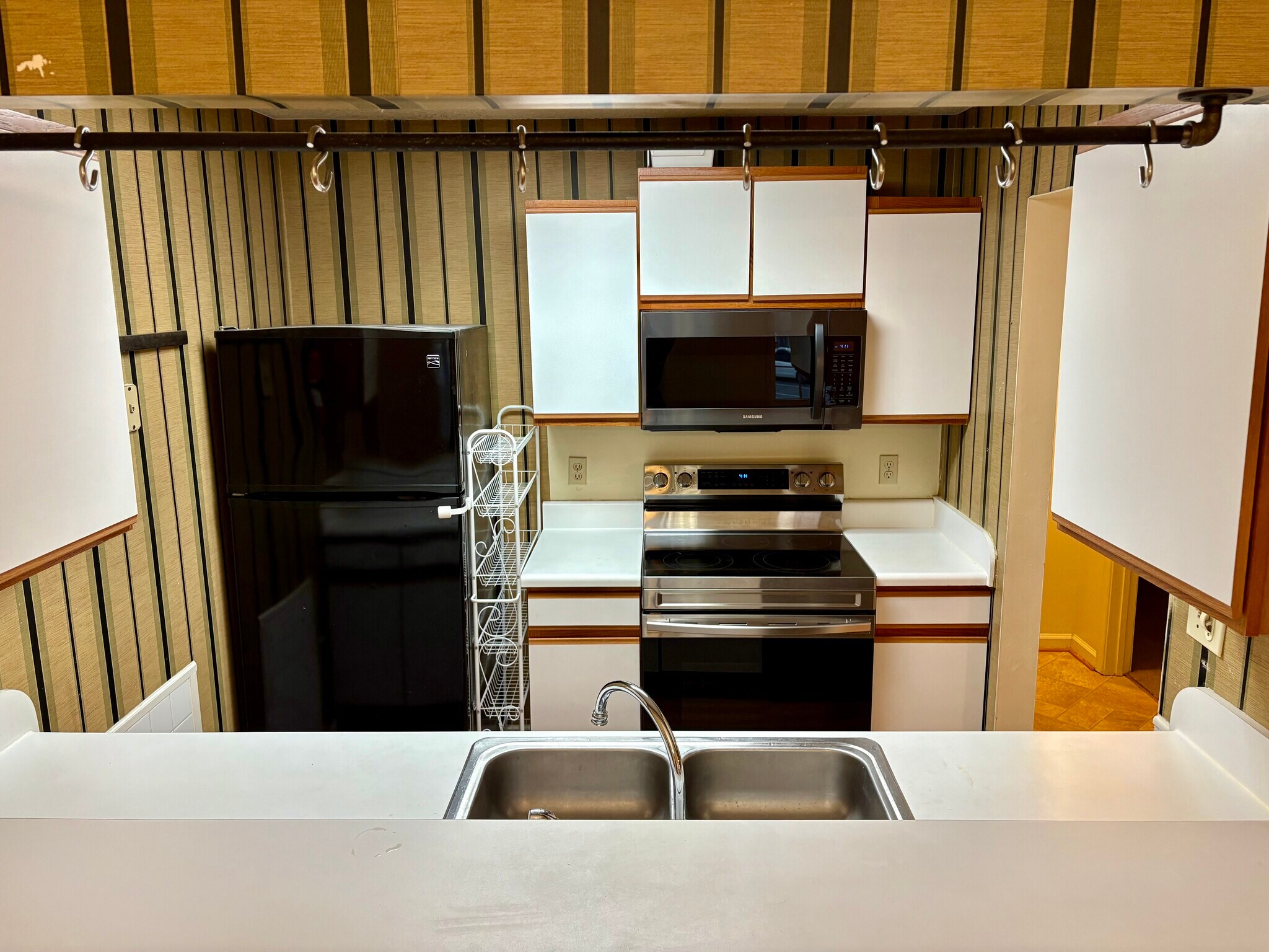 View of kitchen from the pass-through - 208 Quarter Trl