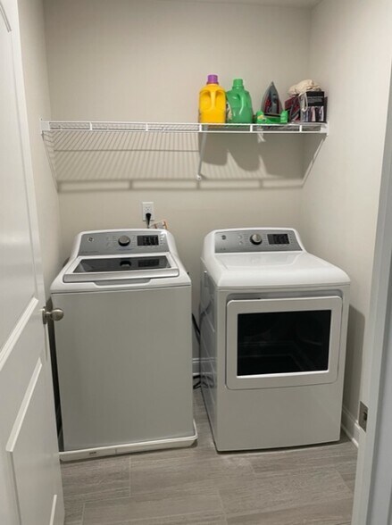 Laundry room in identical t/h - 866 Longleaf Ln