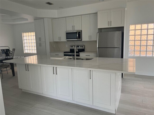 Building Photo - 4741 NW 122nd Dr