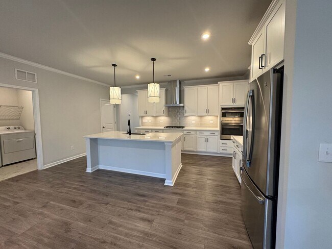 Building Photo - Spacious 1.5-Story 4BR Home with Bonus Room in Active 55+ Community