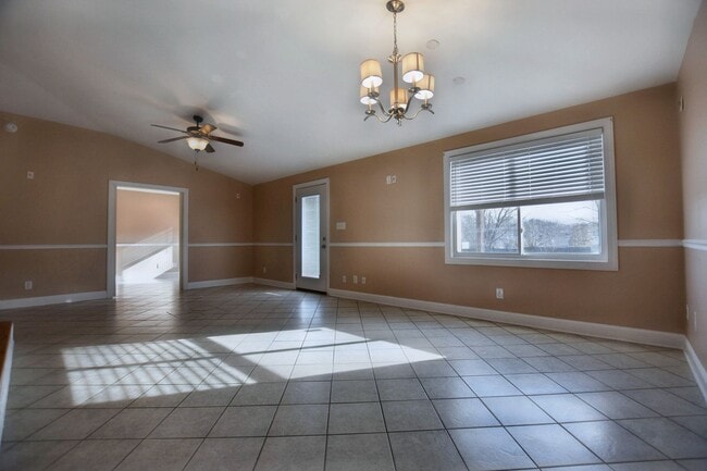 Building Photo - Pet Friendly Three Bedroom with Bonus!