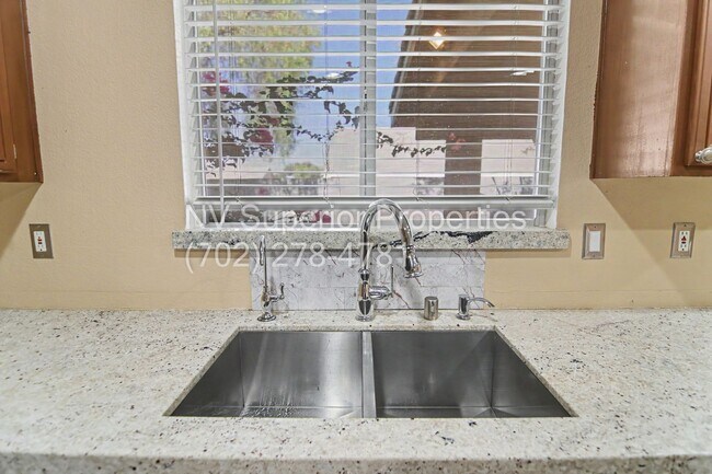 Building Photo - NW!! 4 bedrooms!! Bed & Bath DownStairs!!! RV Parking!!! Synthetic Grass Front yard!! Real Grass ...