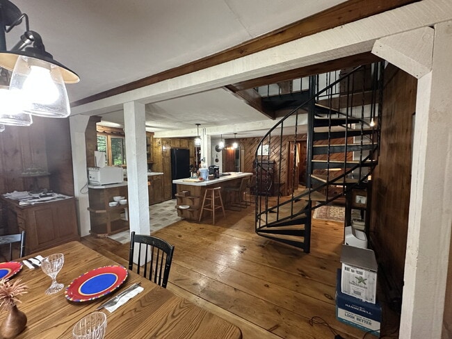 Building Photo - Peaceful Waterfront Living: 2-Story Home on River Road with Ample Outdoor Storage & Water Extras!