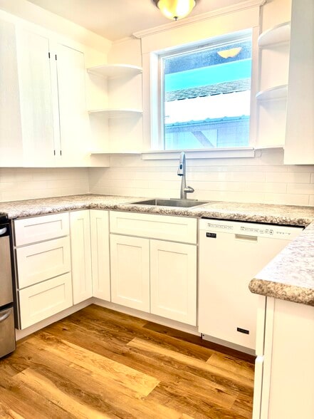 brand new cabinets, countertops, tile backsplash - 601 J Street