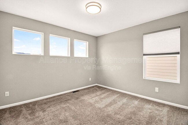 Building Photo - 7108 Passing Sky Dr