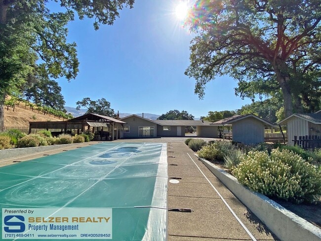 Building Photo - Spacious 4 bd. gated country estate w/ pool!