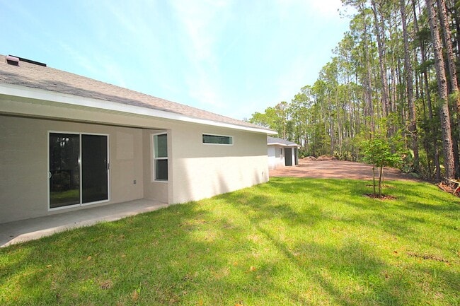 Building Photo - Spacious 4 Bed 2 Bath 2 Car Townhome Built in 2022 in Palm Coast!