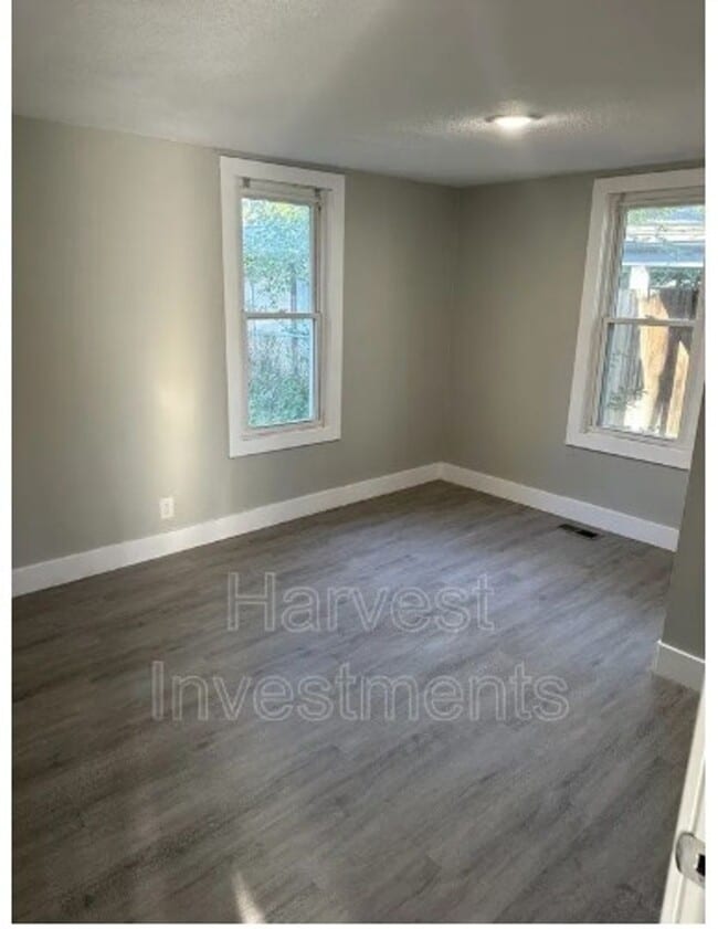 Building Photo - Welcome to Your Next Home with Harvest Investments!