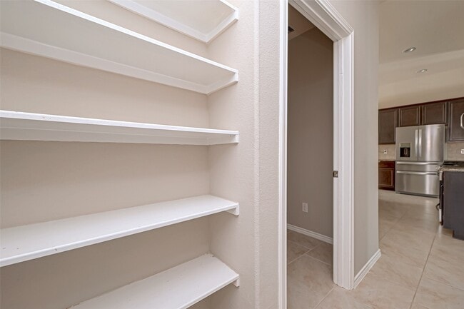 Building Photo - 8402 Coral Cove Pass Ln