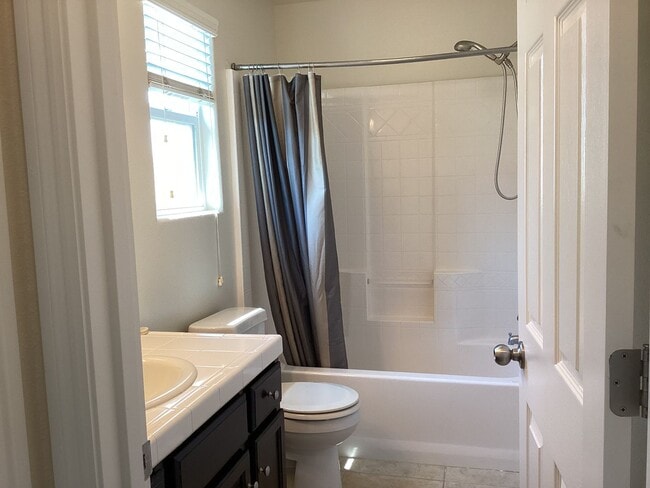 Building Photo - 7009 Harmony Dr