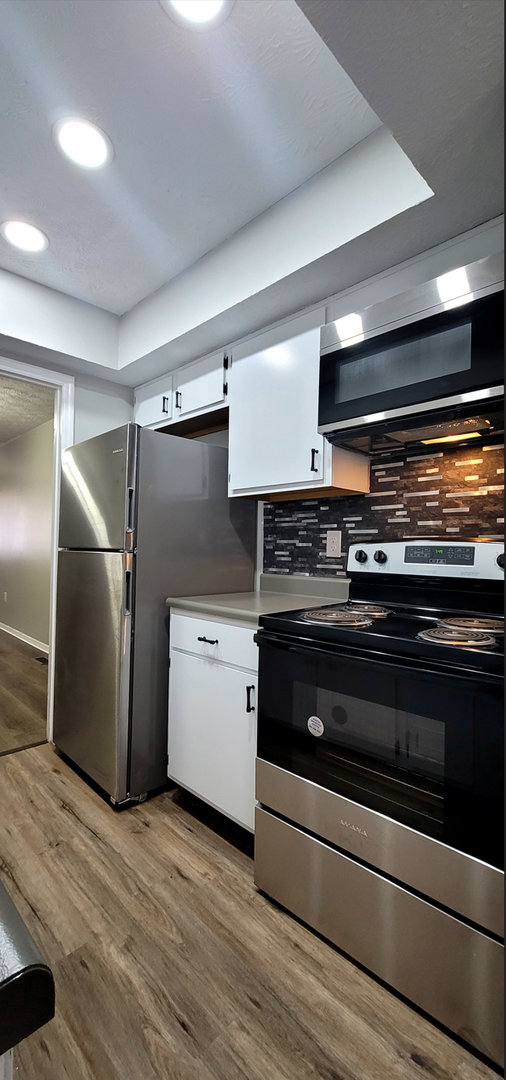Building Photo - Beautiful 2 bedroom 1.5 bath Condo with at...