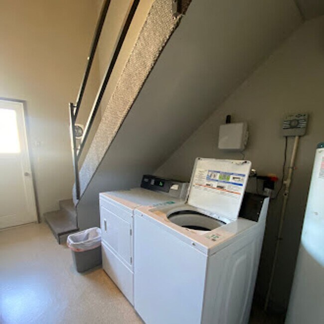 Building Photo - Move-In Ready With Updated Floors You’ll Love!