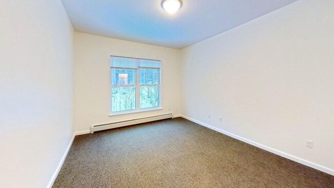 Building Photo - 2 bed, 1 bath townhouse style apartment with washer & dryer provided (59 Griffin Ln #202)