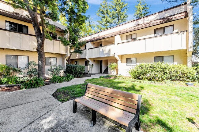 Building Photo - Stylish End-Unit Condo l Private Patio l C...