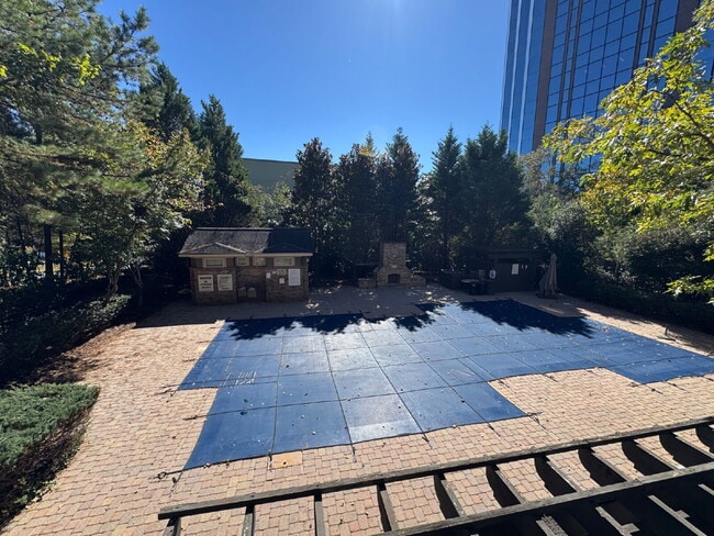 Building Photo - Modern 1-Bed Townhome Near Perimeter Mall ...