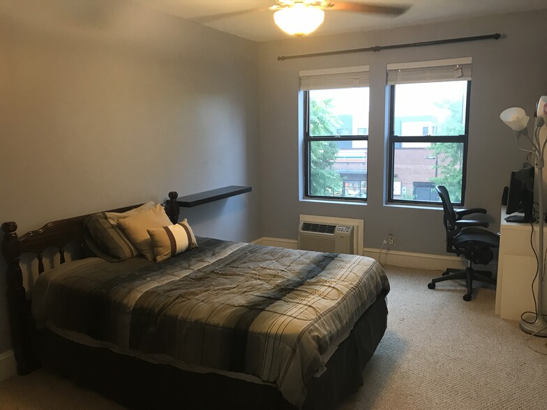 Guest bedroom with plenty of natural light and desk - 3719 12th St NE