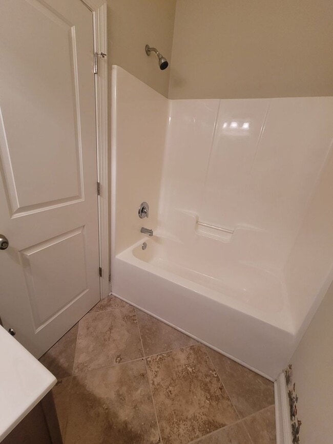 Building Photo - This 3 bedroom 2.5 bath brick townhouse with one car garage is located in Westgate Shoreline subd...