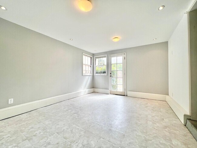 bottom floor bedroom French door to backyard - 1390 Dwight Way