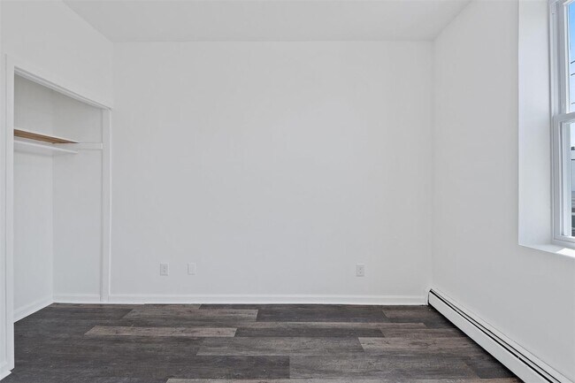 Building Photo - 310 Paterson Plank Rd