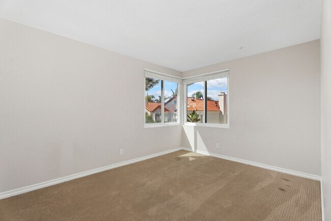 Building Photo - Coastal Elegance Meets Family Comfort in D...