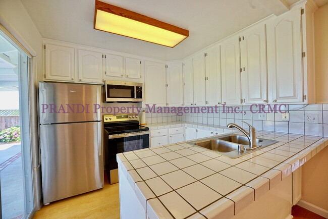 Building Photo - Serene Living on the Water’s Edge – Bright...