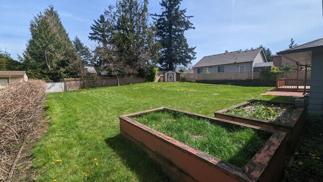 Building Photo - Spacious Three Bedroom with Large Backyard...